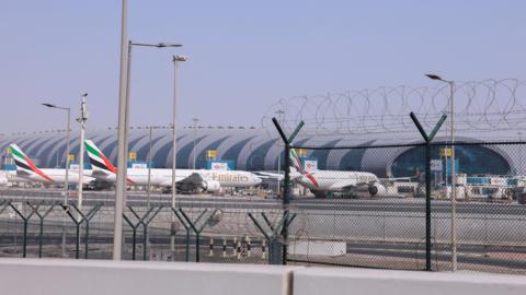 Planes parked at Terminal 3 of the Dubai International Airport, following the United States and Israel strikes on Iran, in Dubai