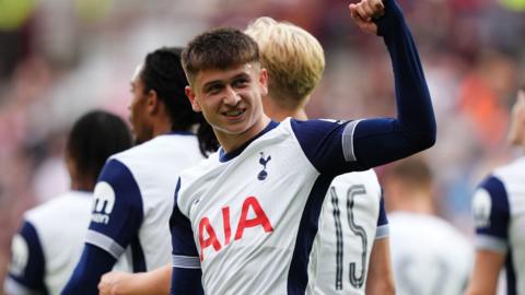 Mikey Moore celebrates a goal for Tottenham