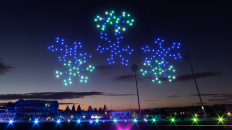 A drone display in the form of snowflakes above Nottinghamshire County Cricket Club's Trent Bridge ground