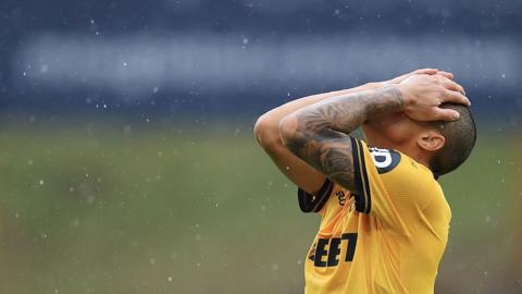 Wolves' Joao Gomes looks dejected
