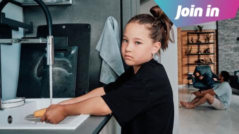 fed up girl doing washing up
