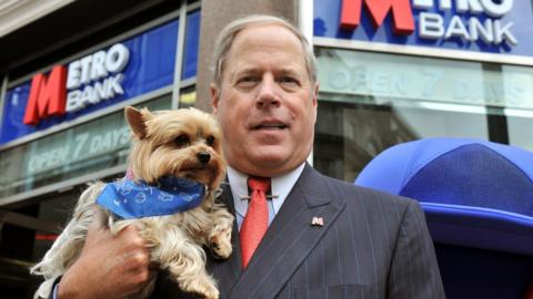 Metro Bank chairman and founder Vernon Hill with his dog Duffy