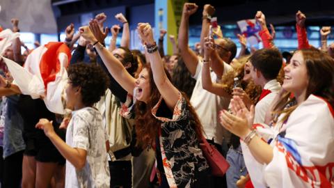 People celebrate as the Lionesses win Euro 2025. 