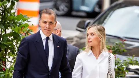 Hunter Biden (L) and his wife Melissa Cohen Biden (R), arrive for the second day of jury deliberations