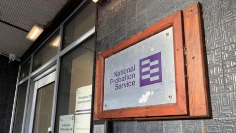 Probation office door with National Probation Service sign