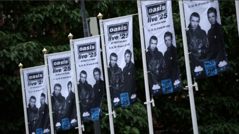 Banners advertising Oasis's five nights of gigs at Heaton Park, Prestwich