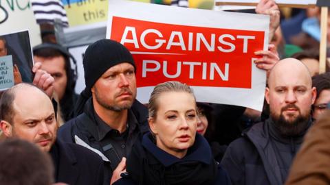 An anti-war demonstration in Berlin is led by prominent Russian opposition figures, including Yulia Navalnaya (C) and Vladimir Kara-Murza (L), on 17 November 2024.