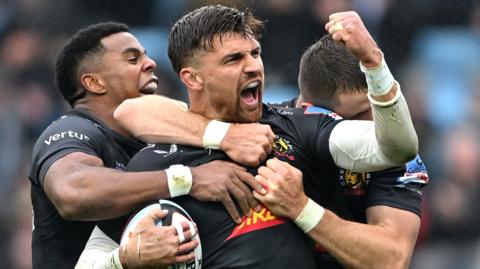 Henry Slade celebrates a try for Exeter