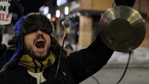 Protester outside of the hotel they believe Gregory Bovino is staying.