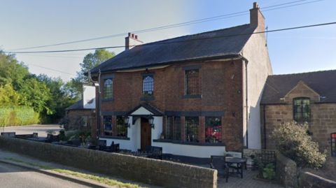 An exterior image of the Black Swan pub in Idridgehay