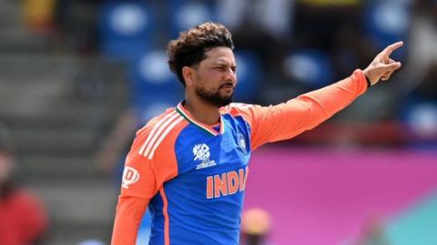 India spinner Kuldeep Yadav celebrates taking a wicket