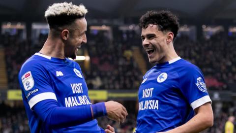 Cardiff City's Callum Robinson (left) and Alex Robertson (right) celebrate