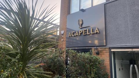 The outside of Acapella bar