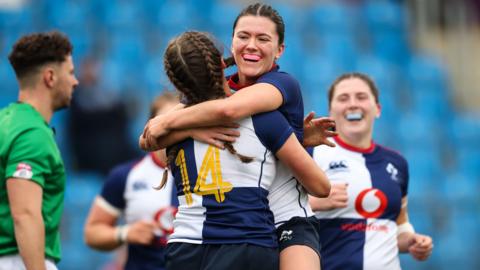 Katie Corrigan celebrates try