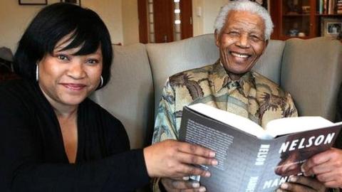 2010 file picture of former South African President Nelson Mandela next to his daughter Zindzi (L) and fellow former political prisoner Ahmed Kathrada (R) in this handout photograph released by the Nelson Mandela Foundation