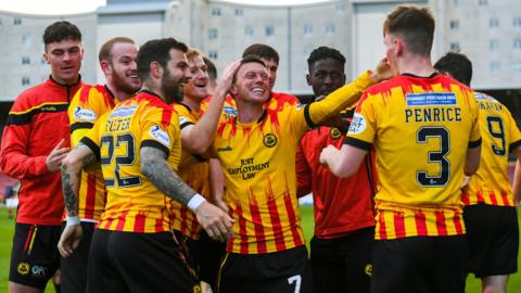 Partick Thistle celebrate their title triumph