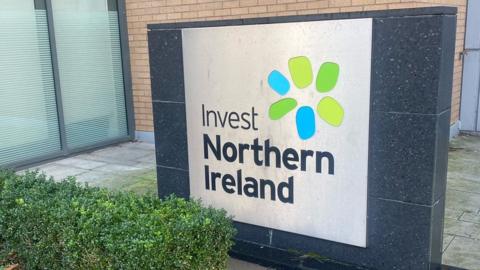 A sign that reads: Invest Northern Ireland