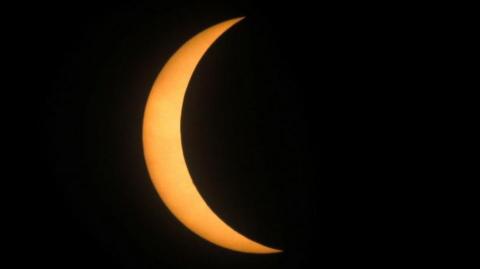 A partial solar eclipse is seen from Mazatlan, Mexico April 8