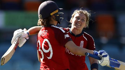 Heather Knight is hugged by Natalie Sciver after her century