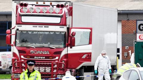 Lorry and forensics officers