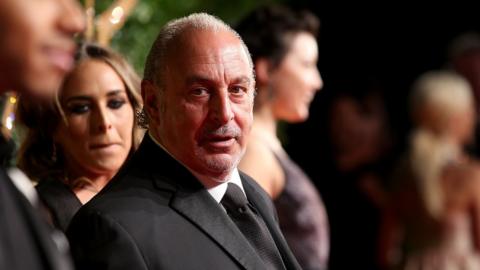 Sir Philip Green at a fashion event