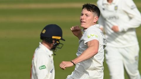 Durham bowler Matthew Potts celebrates