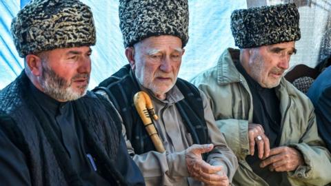 Ingush protesters take part in a rally against a controversial land swap deal between Ingushetia and Chechnya in 2018