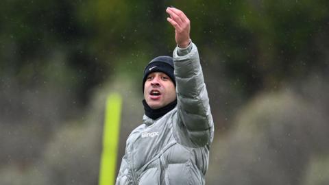 Liam Rosenior gesturing on the training pitch