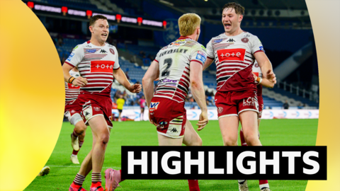 Wigan's Zach Eckersley scores his hat-trick try against Huddersfield