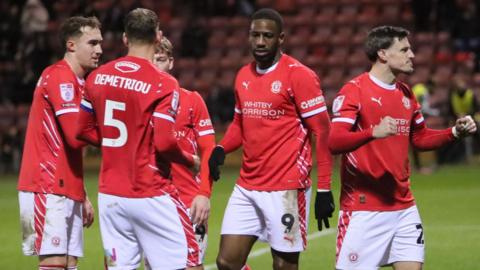 Crewe's Josh March celebrates with his team-mates after scoring in the 4-1 win over Cheltenham