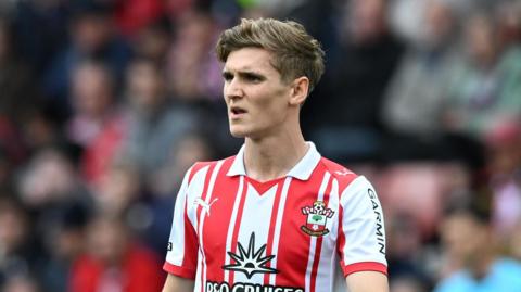 Elias Jelert standing on the pitch