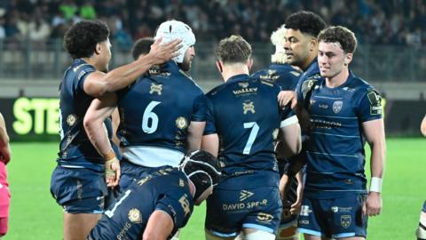 Dragons players celebrate Harrison Keddie's try