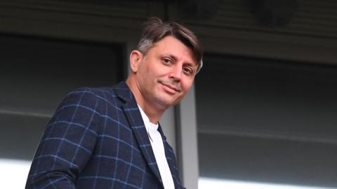 Tan Kesler outside an executive box at Hull's MKM Stadium 