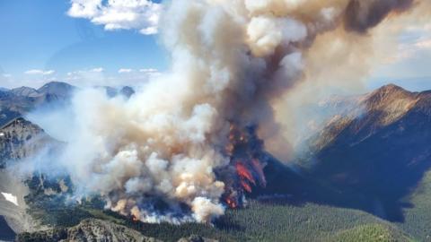 An aerial view of wildfire of Tatkin Lake in British Columbia, Canada on July 10, 2023.