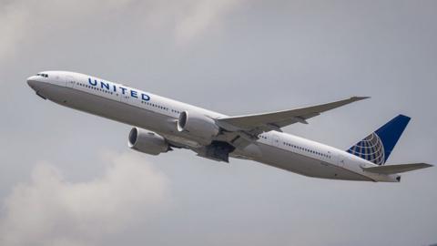 A United Airlines plane in flight