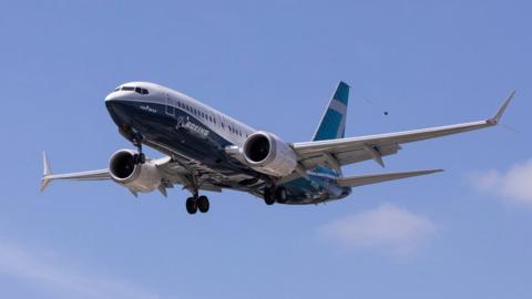 A 737 Max lands after a test flight at Boeing Field in June 2020