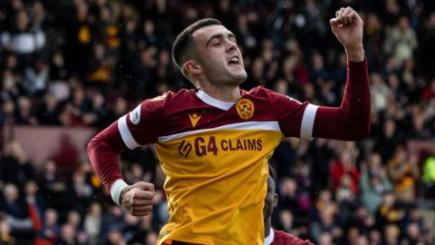 Motherwell midfielder Lennon Miller celebrates