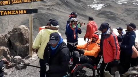 Martin Hibbert as he reaches Gilman's Point summit on the mountain