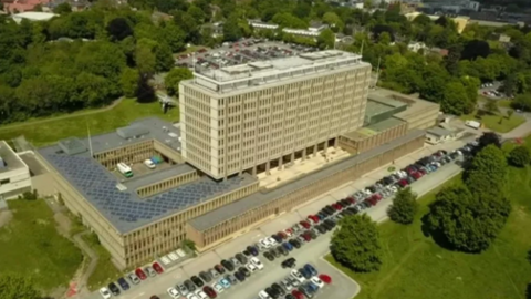 An aerial view of County Hall, the headquarters of Norfolk County Council. It's a large multi-storey building surrounded by car parks.