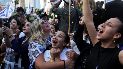 crowds celebrating in hostages square