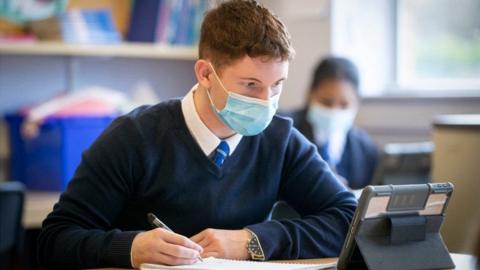 School pupil wearing face mask