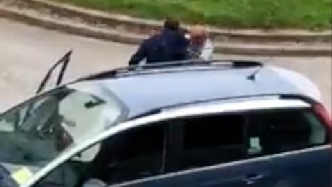 Still of video showing assault