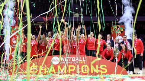 The England Vitality Roses celebrate as they lift the trophy after winning the final during Vitality Netball Nations Cup Final