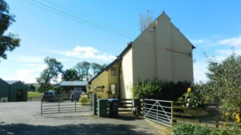A farmhouse in the Borders countryside