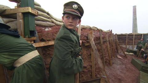 Boy taking part in WW1 re-enactment