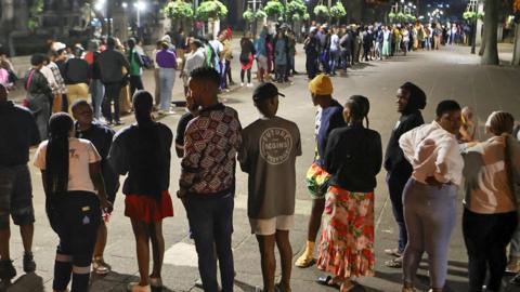 People queue to cast their votes in the South African elections in Durban, South Africa May 29, 2024.