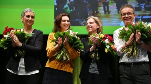 Green party MPs applaud on 4 January 2020 after the party's congress backs their coalition.