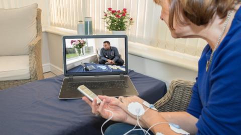 Stock image of patients having a virtual appointment with her doctor