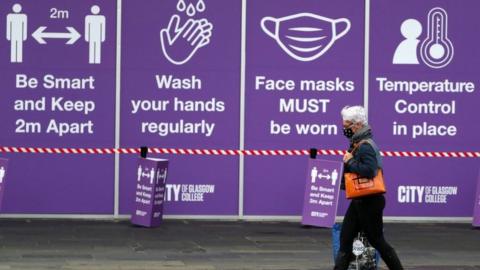 Woman walking in Glasgow