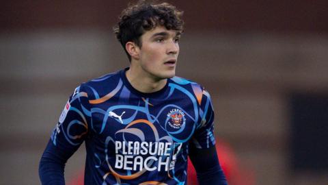 Striker Kyle Joseph in action for Blackpool